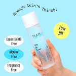 Hand holding Tiam Vita B5 Toner skincare product