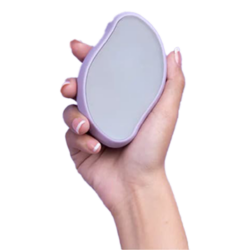 Hand holding compact mirror with white background